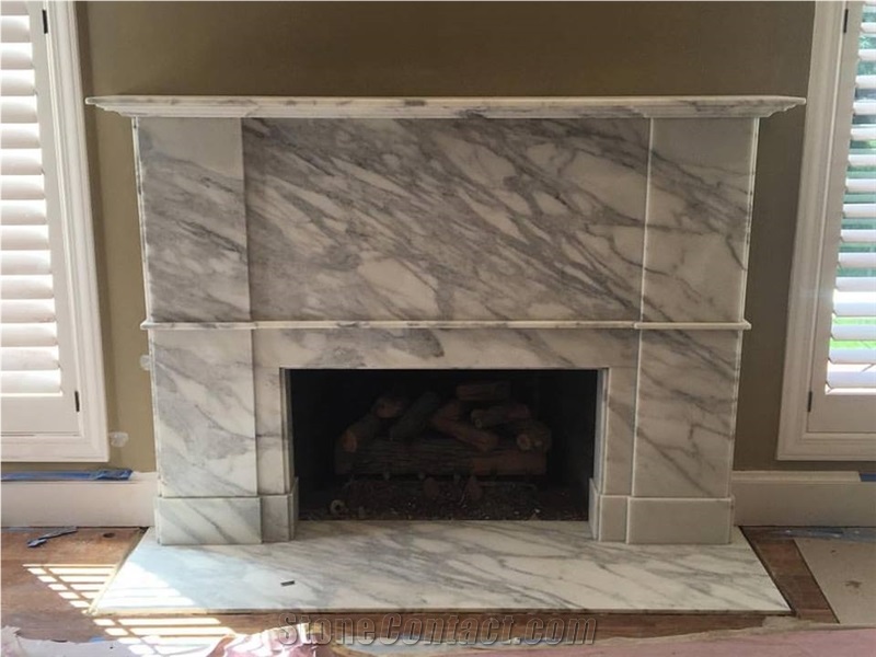 Honed Calacatta Oro Marble Fireplace Installed