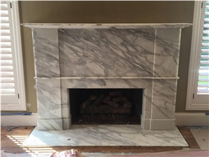 Honed Calacatta Oro Marble Fireplace Installed