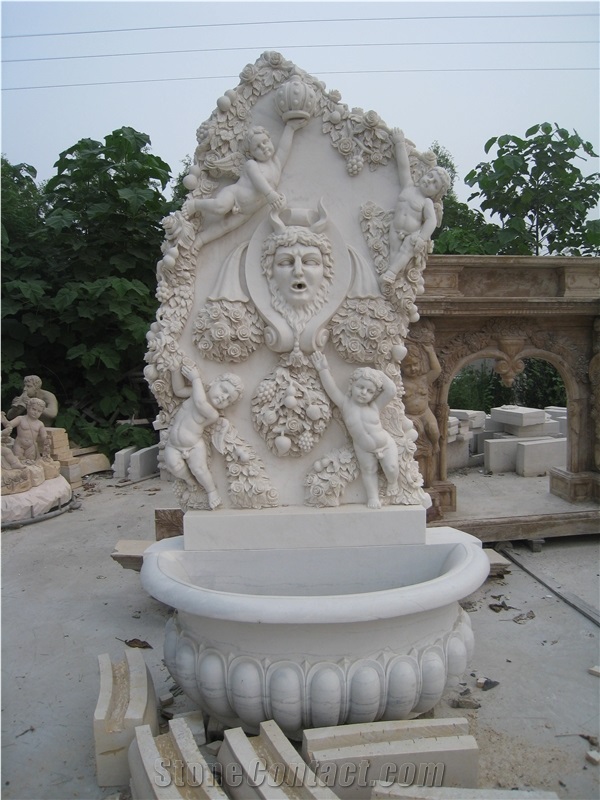 White Marble Wall Fountain with Hand Carved Sculpture