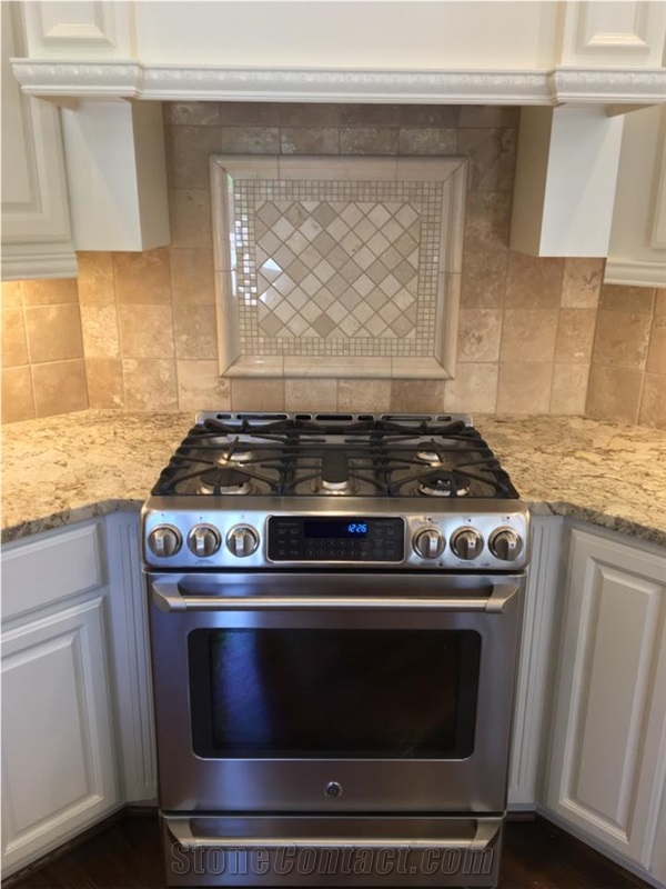 Granite Countertop, Beautiful Travertine Backsplash with Decorative Mural over Cooktop!