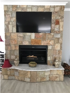 Sandstone Masonry Traditional Fireplace with White Marble Hearth