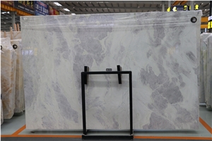 China Snow White Blue Lines Marble Slabs For Sale Light transmit Hotel
