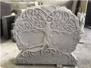 Grey Moument With Tree Carving To USA