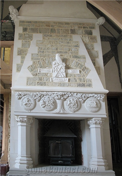 A Heavily Carved and Enriched Gothic Revival Fireplace in Surrey