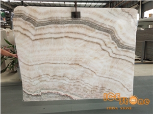 China Large Quantity Bookmatched Perfect Transpancy Beige Onyx