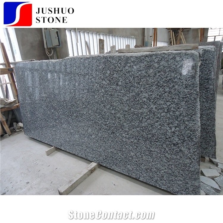 China Popular Cheap Spray/Seawave White Granite Polished Tiles Slabs