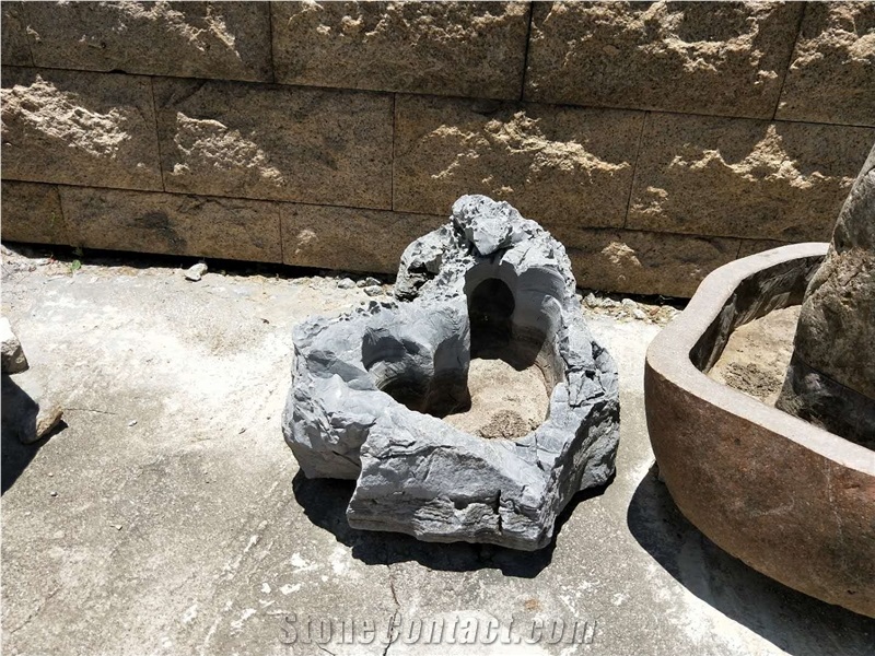 https://pic.stonecontact.com/picture201511/20186/148046/flower-pot-made-from-granite-blocks-garden-landscaping-planters-p651534-5b.jpg