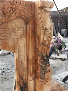 Sun Glow Red Marble Fireplace