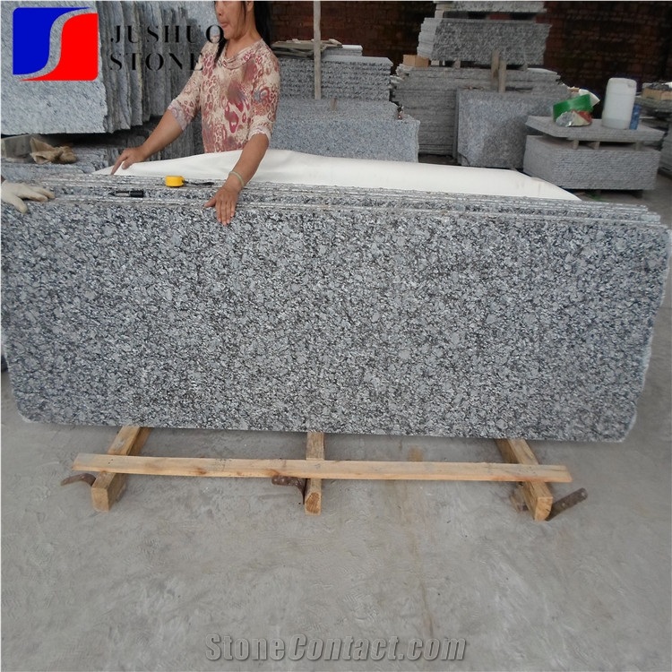 China Granite Tiles Spray White Granite Blocks Sea Wave Granite
