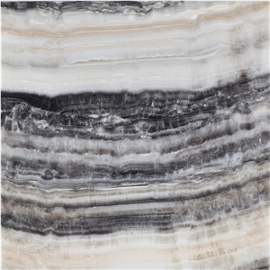 White Vein Cut Onyx Tiles and Slabs