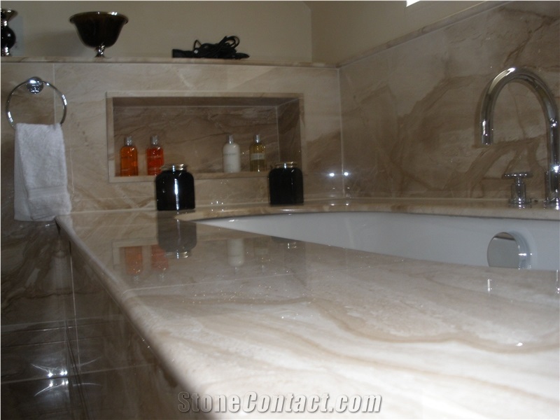Pale Marble Bathroom with Recess Behind Bath