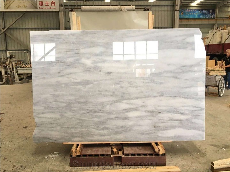 Cloudy White Slabs and Tiles