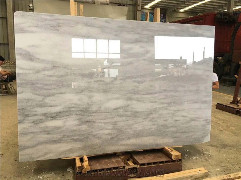 Cloudy White Slabs and Tiles