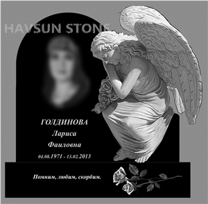 Black Monument with White Marble Angel Tombstone