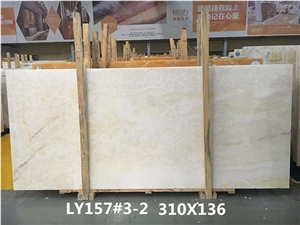 White Ice Onyx Slab with Light Yellow Grains