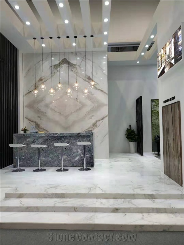 Bookmatched White Marble Slab Wall Background