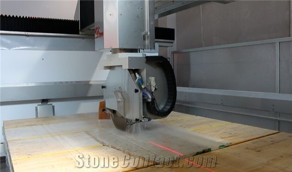 Helios Dea revolutionary bridge saw and machining center with 5 interpolated axis