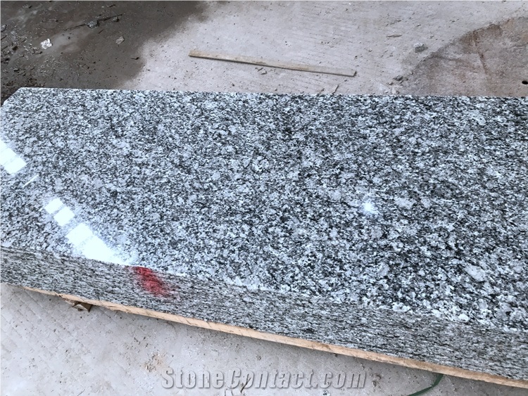 Chinese Seawave Spray White Granite Tiles