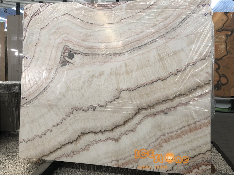 Rainbow Red Dragon Onyx slabs & tiles bookmatch