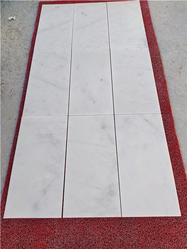 Carara Venato Marble Tile 12x24. Honed