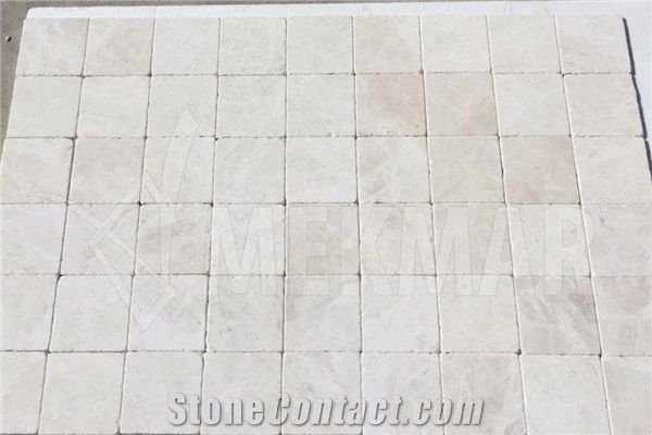 cream tumbled marble backsplash
