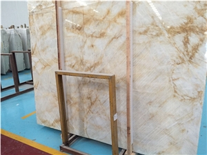 White Onyx with Gold Veins Slabs