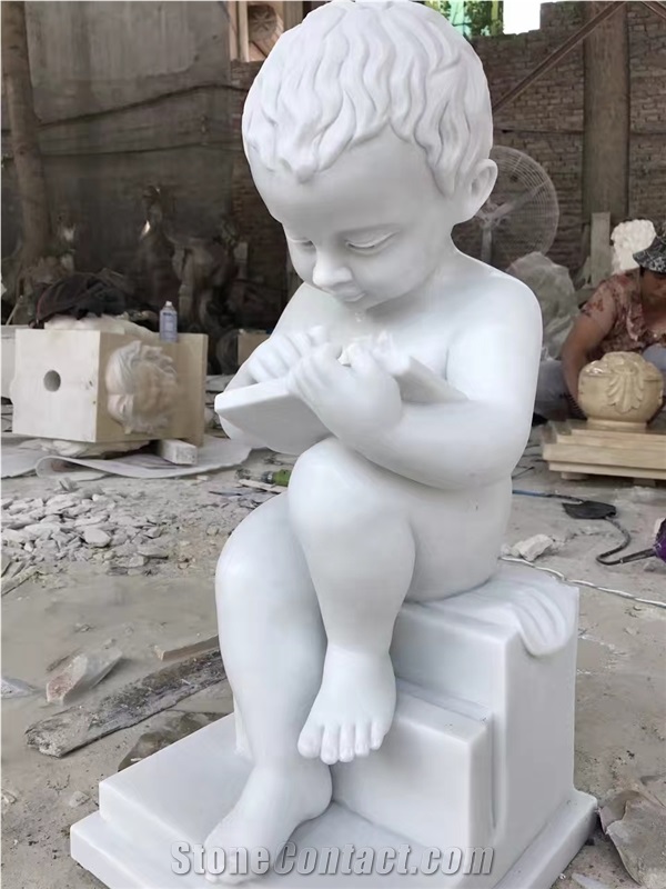 Little Angel Boy Reading a Marble Sculpture