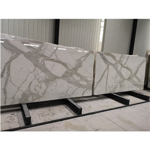 White Boulgauri Bookmatched Calacatta Marble Slabs