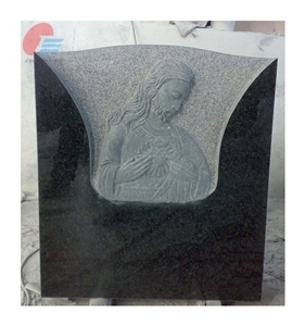 Black Granite Headstone with Sacred Heart Relief