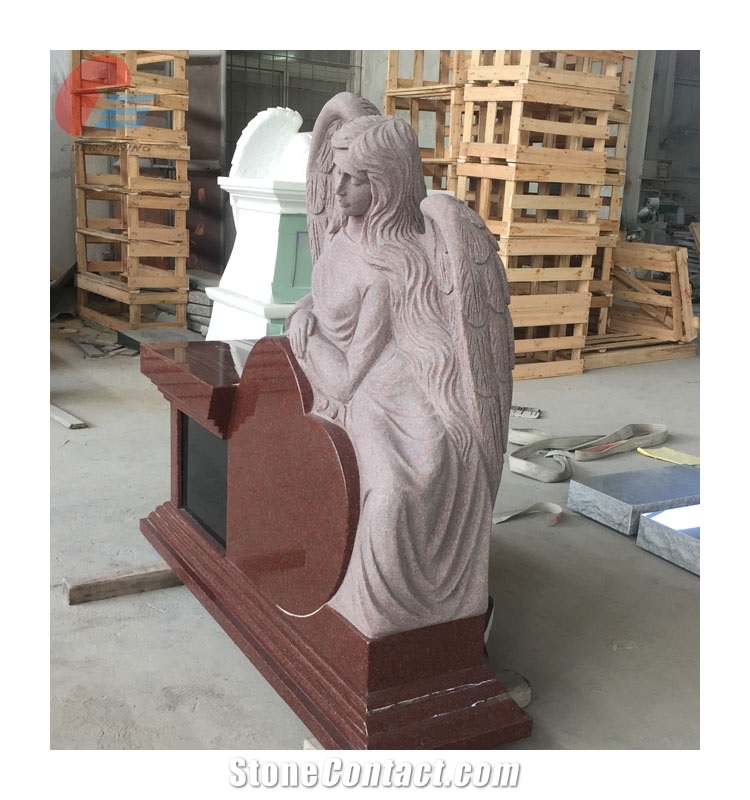 Red Monument with Heart Design and Carving Angel