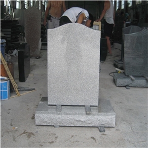 Angel Beside Headstones with Polished Red Granite