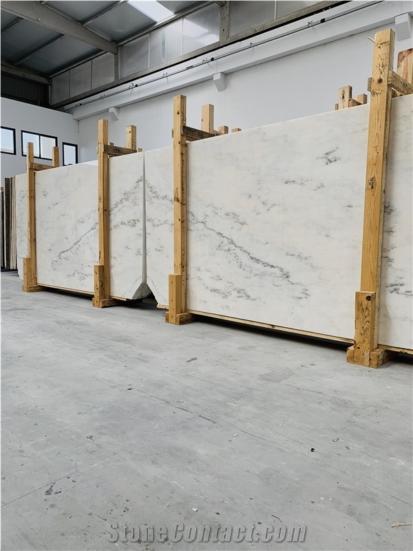 Cream Estremoz Marble, White Michelangelo Slabs