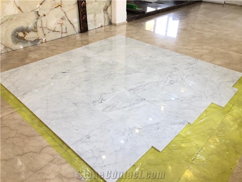 Wavy White Marble Slabs and Tiles