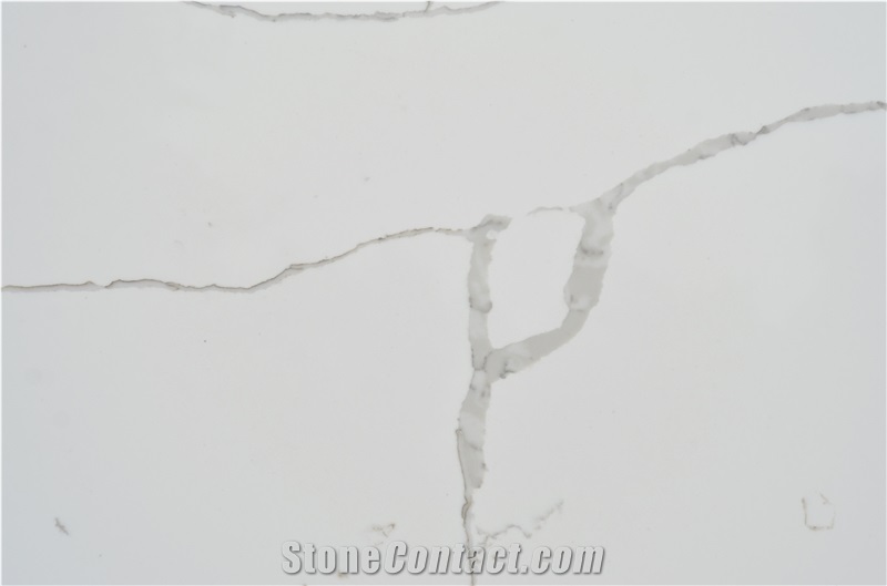 Bookmatched Veins in White Calacatta Quartz Slab