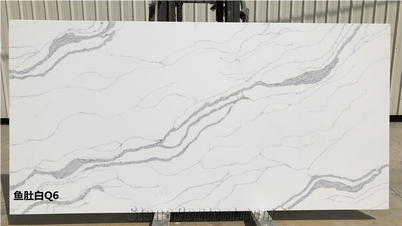 Bookmatched Veins in White Calacatta Quartz Slab