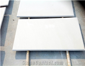 Pure White Marble Pool Cap and Surrounding Tile