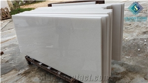 Pure White Marble Tiles and Slabs