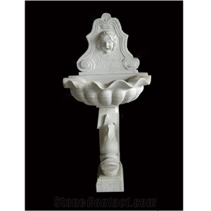 Wall Mounted Fountain in Carved White Marble