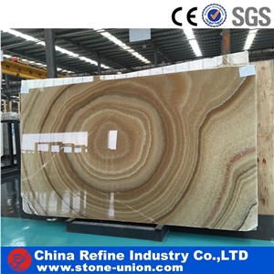 Yellow Onyx Pattern Covering Slabs