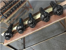 Symmetric Overburden Casing System Drilling Tools
