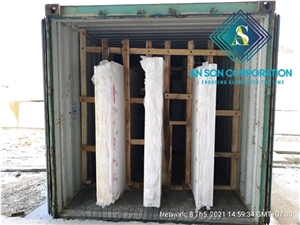 Packing and Loading White Marble Slabs from Vietnam