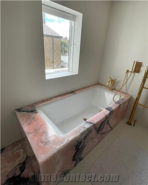 Pink Onyx Bathtub Deck and Surroubnd