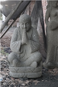 The Green Stone Greeting Monk Sculpture