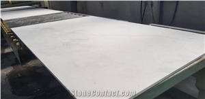 Kyknos White Slabs and Tiles