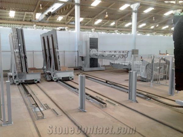 Unloading system with automatic selection trolleys