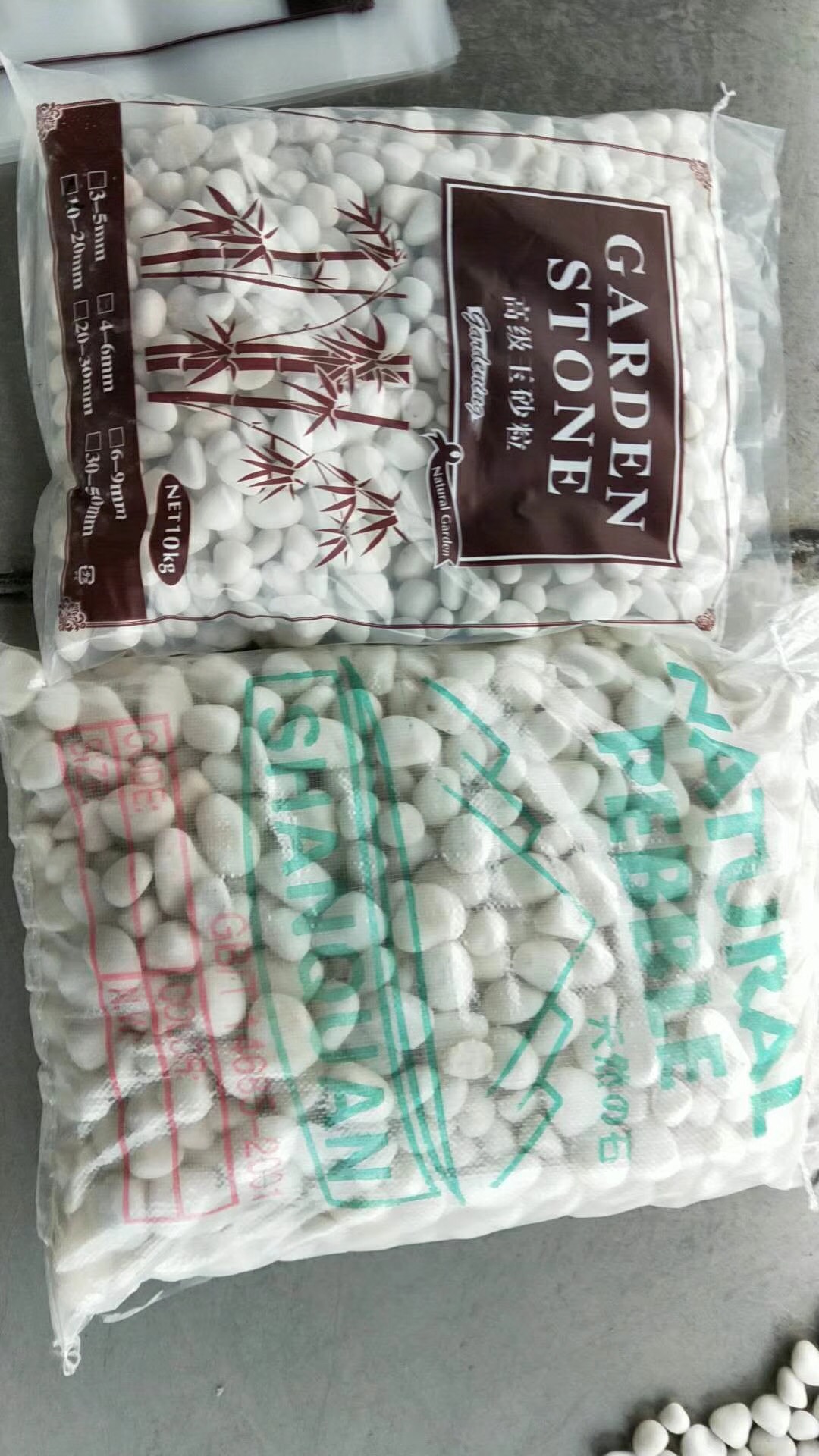 white pebbles in small packing.JPG
