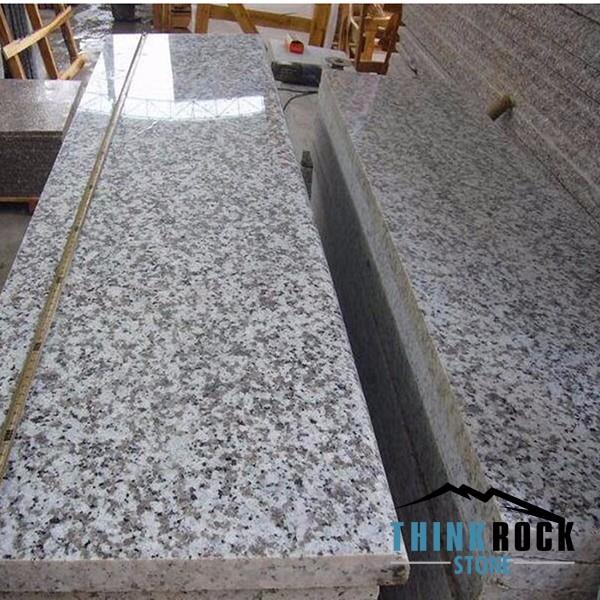 natural grey granite stairs tread with polished surface.jpg