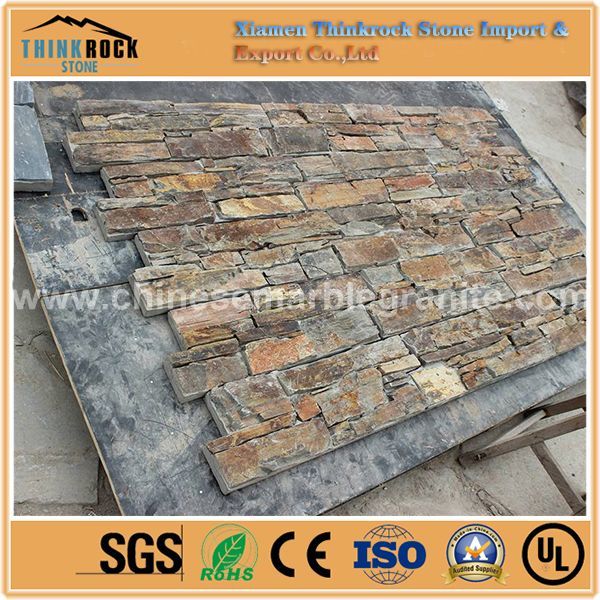 dramatic mix of rich colors natural split rusty brown culture stone facing for walls for bridges.jpg