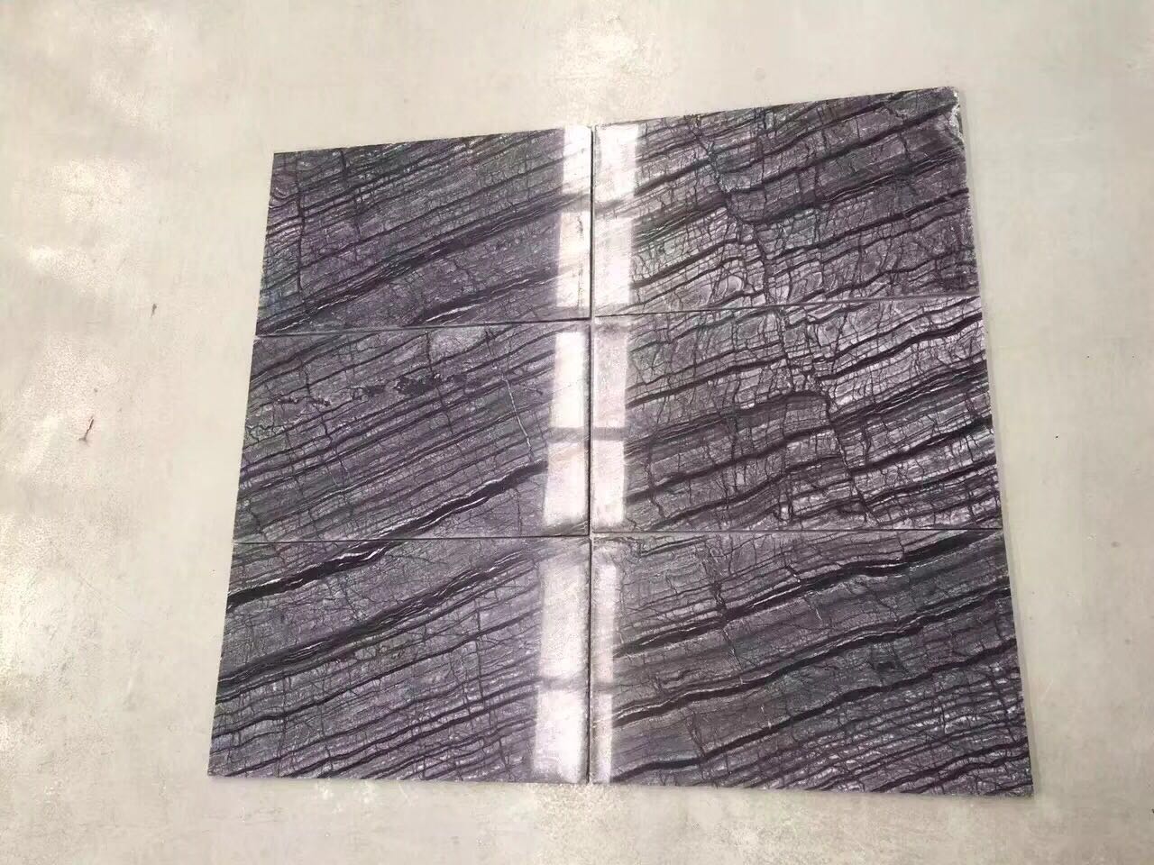 silver wave black wood marble.jpg