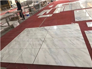 Baoxing White marble tile slabs price 